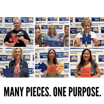 Photo of Donors with Puzzle Pieces